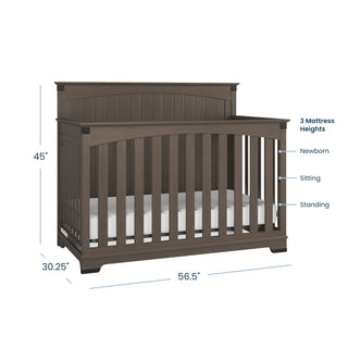 The Child Craft Redmond 4 Piece Nursery Set includes a convertible crib with slatted sides, solid back panel, and 3 mattress heights—Newborn, Sitting, Standing. Crib dimensions: 45"H x 30.25"D x 56.5"W. Ideal for any nursery furniture collection.