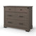 The Child Craft Redmond 3 Drawer Dresser in Dapper Gray features two small drawers with round black knobs and a large lower drawer with a bar handle, all on short feet—ideal for keeping your nursery organized.