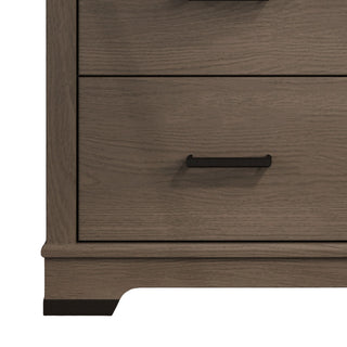 Close-up of Child Craft’s Redmond 3 Drawer Dresser in Dapper Gray, highlighting the lower section with two drawers featuring black handles and a sturdy base with dark feet.