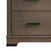 Close-up of Child Craft’s Redmond 3 Drawer Dresser in Dapper Gray, highlighting the lower section with two drawers featuring black handles and a sturdy base with dark feet.
