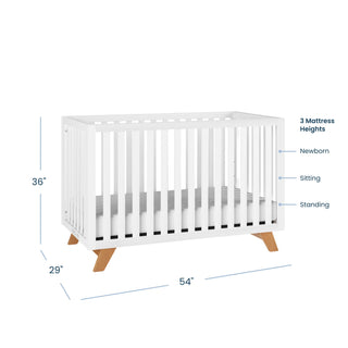 The Child Craft Soho 2-Piece Crib and DreamWeave Set in Matte White features wooden legs and measures 36" H x 54" W x 29" D. A diagram shows adjustable mattress heights (Newborn, Sitting, Standing) for use with the breathable HALO DreamWeave mattress.