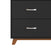A close-up of the Child Craft Soho 3-Drawer Dresser in Ebony features two silver handles and wooden angled legs, highlighting its sleek side and drawers—an ideal choice for stylish nursery furniture.