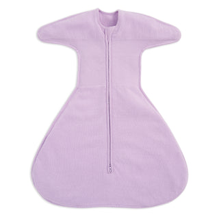 The HALO SwaddleStretch™ Newborn Swaddle TOG 0.5 in light purple has a front zipper, wide wings, and a roomy bottom, offering swaddle comfort while letting your baby move freely.