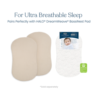 Two beige BassiNest® Fitted Sheets (100% organic cotton muslin, 2-pack) by HALO and a packaged patterned white HALO DreamWeave pad are shown. "For Ultra Breathable Sleep" is highlighted with a GREENGUARD certification icon visible.