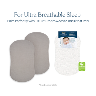 Two gray oval pads (HALO BassiNest® Fitted Sheet 100% Organic Cotton Muslin 2-Pack) are shown next to a white quilted bassinet pad with a baby’s photo on the packaging. Text reads: "For Ultra Breathable Sleep. Pairs perfectly with DreamWeave BassiNest Pad.