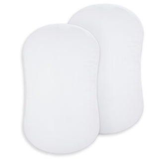 Two white, oval-shaped pads made of 100% organic cotton are shown side by side. These HALO BassiNest® Fitted Sheets come in a 2-pack and are ideal for use as newborn bassinet sheets.