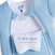 A light blue HALO Baby Merlin's Magic Sleepsuit® 100% Cotton, size Small, features two parallel zippers with a white inner flap labeled Double zipper for easy opening—perfect for sleep regression or swaddle transition.