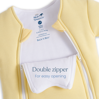 Close-up of HALO’s Baby Merlin's Magic Sleepsuit® 100% Cotton in yellow, size small (12–18 lbs/5.4–8.2 kg), featuring two white double zippers for easy opening—perfect for swaddle transition.