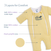 The HALO Baby Merlin's Magic Sleepsuit® 100% Cotton in yellow features white zippers and trim, with labeled comfort layers: soft cotton outer, 100% cotton lining, and plush polyfill—perfect for swaddle transition.