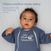 A baby in a blue HALO Baby Merlin's Magic Sleepsuit® 100% Cotton rests on a light blue surface, gazing upward. Caption: Comfort meets safety—ideal for swaddle transition and safe back sleeping in the crib.