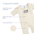 An illustration of the HALO Baby Merlin's Magic Sleepsuit® 100% Cotton in cream, highlighting its three layers: a soft cotton exterior, cotton lining, and plush polyfill core—perfect for comfortable swaddle transitions.