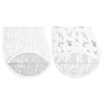 Two aden + anais organic cotton muslin burpy bibs are laid out side by side. The left bib has small gray dots, while the right one shows gray animal shapes, including elephants and giraffes. Both have a curved edge with white trim and are GOTS certified for quality.
