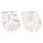 The boutique silky soft burpy bib 2 pack by aden + anais includes two absorbent, rounded 2-in-1 burp cloths. The first features a pastel watercolor pattern of pink, blue, and green, while the second offers softer blended hues. Both have luxurious silkiness and white edges.