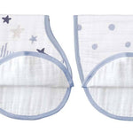 The aden + anais boutique 100% cotton muslin burpy bibs 2 pack features two white cloths, one with star patterns and the other with blue polka dots, both trimmed in blue. With a patented design and unique curved bottom shape, they cleverly serve both as absorbent bibs and burp cloths.