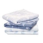 A set of three organic cotton muslin squares by aden + anais, in soft blue and white with subtle patterns, neatly arranged on a white background, perfect for any babys needs. GOTS-certified essentials in every pack.