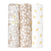 Three rolls of fabric stand upright: the left displays a bamboo-infused viscose with gray and yellow floral and animal patterns, the middle has a beige background with white leaves, and the right features an aden + anais boutique silky soft swaddle blanket on a white backdrop with yellow leaves.