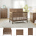 A nursery with the Child Craft Atwood 3-Piece Nursery Set, featuring a crib, dresser, and chest, pairs wooden furniture with light walls, patterned wallpaper, a large window with white curtains, and cozy decorative accents.
