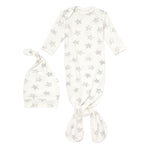 The aden + anais snuggle knit™ newborn gown + hat set, featuring a white gown with gray stars and long sleeves plus a matching knotted bottom, includes an infant hat with a knotted top, ideal for baby essentials.