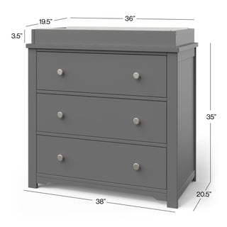 The Child Craft Camden 2-Piece Nursery Set includes a gray dresser with 3 drawers, round silver knobs, and dimensions of 38"W x 35"H x 20.5"D plus a raised back (36" x 19.5" x 3.5"), perfect as a changing table in any nursery.