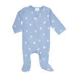 The aden + anais comfort knit™ footie is a cotton-rich blue baby onesie with long sleeves, foot coverings, and a pattern of white crescent moons. It features easy snap closures along the front for convenience.