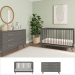 Create a Mid Century Modern nursery with light green walls, the Child Craft Cranbrook 2 Piece Nursery Set (crib and dresser), gold hardware, a round mirror, woven basket plant, stuffed animals, and abstract art above the crib.