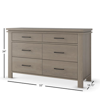 The Denman 2-Piece Nursery Set with Crib and Dresser by Child Craft features a six-drawer wooden dresser with sleek black handles, designed to complement any modern nursery. Measuring 34 inches tall, 55 inches wide, and 18.75 inches deep, this versatile piece provides ample storage for your child’s essentials and coordinates seamlessly with the included crib for a cohesive look.