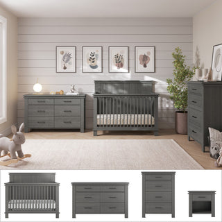 A modern nursery featuring the Child Craft Denman 4-Piece Nursery Set—gray convertible crib, dresser, and chest—styled with botanical prints, a lamp, plush toys, a plant, and a beige rug on light wood floors. See images of each furniture piece below.
