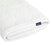 A rolled-up, white quilted DreamWeave Crib Cover by HALO features a textured, hypoallergenic design with a small HALO tag. This breathable mattress pad looks soft and cushioned, ensuring comfortable sleep.