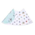 The essentials cotton muslin burpy bib from aden + anais is a triangular, full-coverage bib with a turquoise back and a white front featuring colorful magical item sketches like castles, snitches, snakes, and scarves. Made from absorbent muslin, it captures the whimsy of a fictional world while being functional.