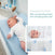 A baby in a white onesie lies on a light blue changing pad in the cozy nursery. Nearby, a basket with baby toiletries sits on a table. Inset image features aden + anais essentials cotton muslin bedding set with blue patterned sheets of bears and moons. Text reads, complete the look.