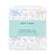 The packaged aden + anais essentials cotton muslin changing pad cover is set against a white background, featuring light blue elephants and yellow giraffes, with text in English and French detailing product size and material.