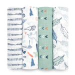 The aden + anais essentials cotton muslin swaddle blanket 4 pack features breathable, soft, lightweight designs including navy dashes, dinosaurs with foliage, teal arrows, and gray leaves on green.