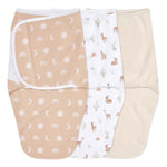 The aden + anais essentials easy swaddle wrap 3 pack includes a beige and peach moon-and-sun design, a whimsical cactus-and-llama print on white, and a solid beige swaddle. Designed with adjustable fasteners, these wraps help prevent newborn startle reflex.