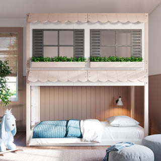 A cozy children’s bedroom features the Child Craft Garden Cottage Twin over Twin Bunk Bed, styled like a house with faux windows, shutters, and flower boxes. The lower bed has blue and white bedding with a blue plush toy nearby.