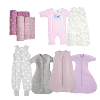 The HALO Grow With Me Bundle offers 2 pink patterned organic cotton swaddle blankets, a pink footed romper, a white-green sleepsack swaddle, a gray star sleep suit, a quilted gray sleep sack, and 2 lavender sleep sacks.