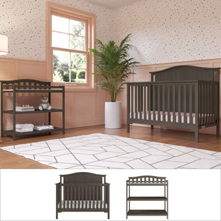 A nursery featuring the Child Craft Hampton Arch Top 2-Piece Nursery Set—crib and changing table—on a geometric rug, with a potted plant, dotted wallpaper, and large window. Below are front views of this set on white.
