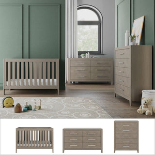 A modern nursery with sage green walls showcases the Child Craft Kieran Euro 3-Piece Nursery Set, including light wood furniture and a tall chest. Toys, a rug, and decor add warmth to this cozy, well-lit space.