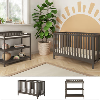A modern nursery featuring the Child Craft London 2-Piece Nursery Set, including a crib and matching changing table. A large potted plant, light rug, and sunburst mural create a cozy vibe. Two product images appear below the scene.