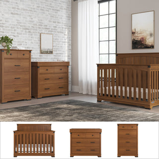 A nursery features the Child Craft Redmond 4 Piece Nursery Set, including a convertible crib with vertical slats, dresser with changing tray, and chest—all in a warm wood finish. A window with white curtains and wall art are visible in the background.