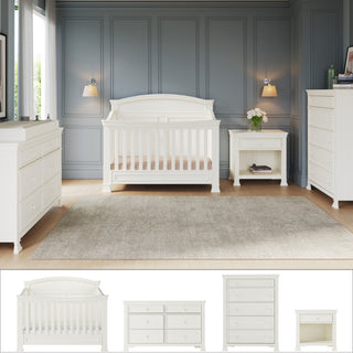 A nursery with gray paneled walls is furnished with the Child Craft Westgate 4-Piece Nursery Set, which includes a 4-in-1 Convertible Crib, dresser, chest, and nightstand all arranged on a light rug. Soft lighting and a vase of flowers create a cozy atmosphere in the baby’s room. Individual pieces from the Child Craft nursery set are displayed below.